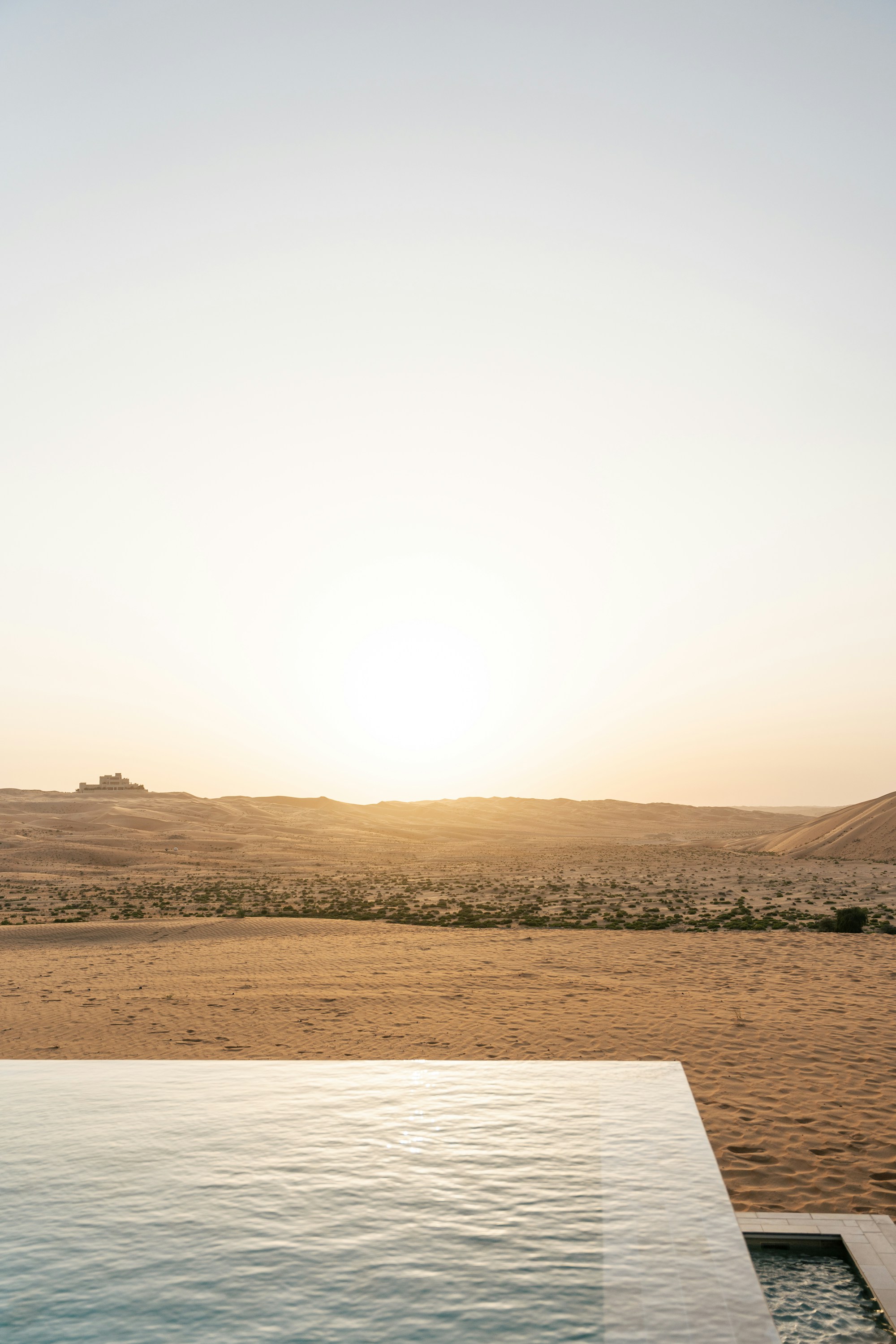 Desert landscape and pool, illustrating the fictional Solace House concept
